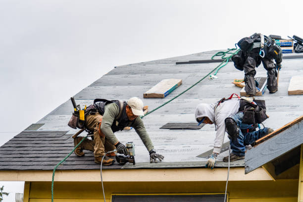 Professional Roofing technician working in Irvington, NY